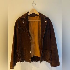 A rare vintage western brown sued leather jacket with fringe